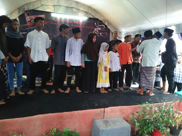WARGA BENDA, KOTA TANGERANG, BANTEN, MERIAHKAN MALAM TAHUN BARU DENGAN SANTUNI YATIM PIATU