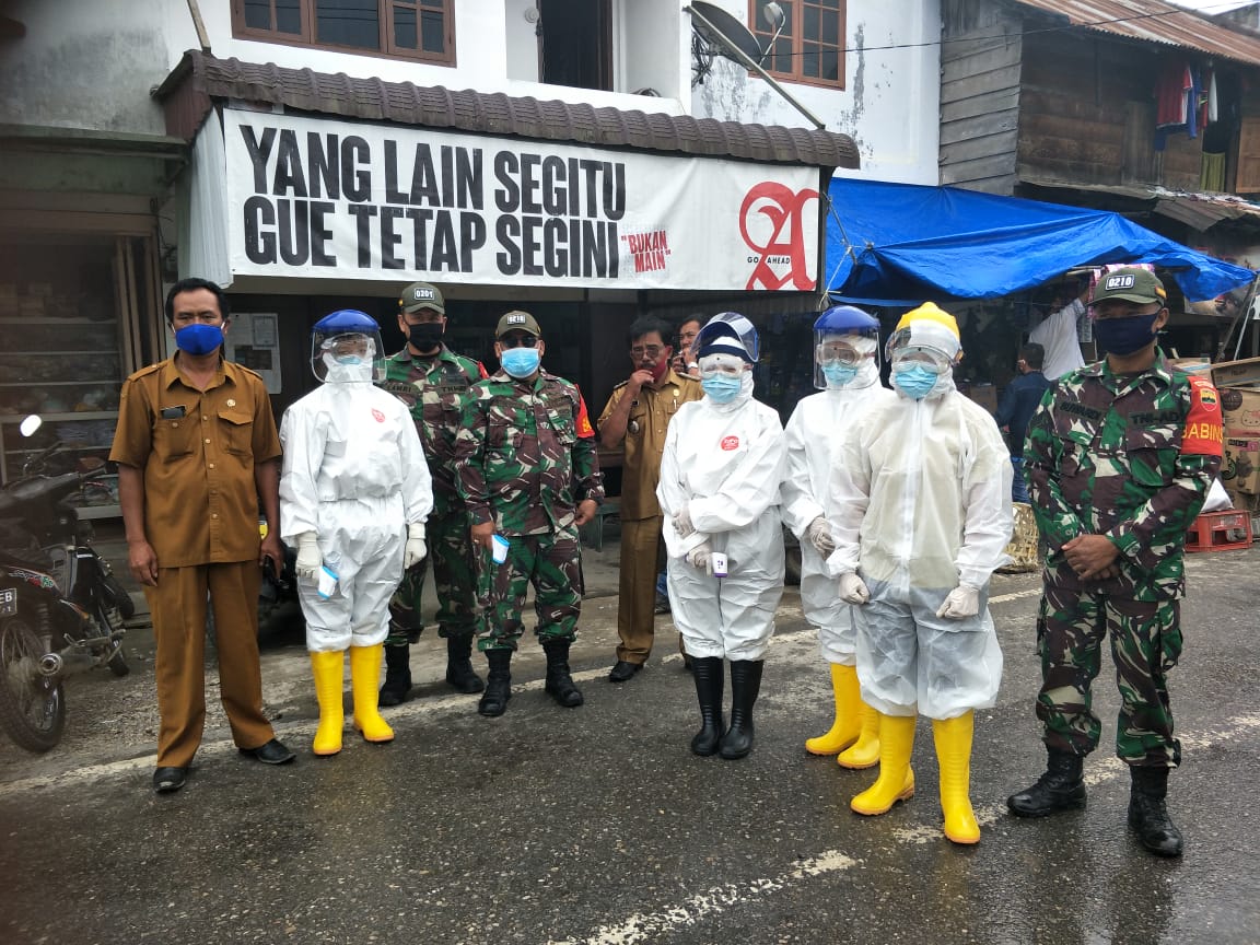Team Gerak Cepat Puskesmas Parsoburan  Bersama Koramil 15/HBS Perketat Penjagaan Pasar