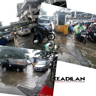 SELAIN GERBANG MASUK STASIUN DEPOK BARU PENUH KUBANGAN AIR , PRAKTIK PEMALAKAN PREMANPUN BERLANGSUNG MULUS
