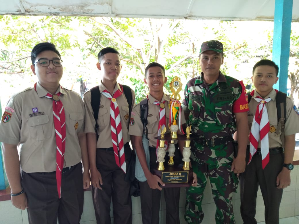 Babinsa kelurahan Kratonan Koramil 03/Serengan Melaksanakan Pengamanan Kenaikan Kelas