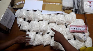 OWNER GUDANG OBAT  PCC ALIAS PIL SETAN MENGHILANG DARI BUI , POLISI SALING TUDING